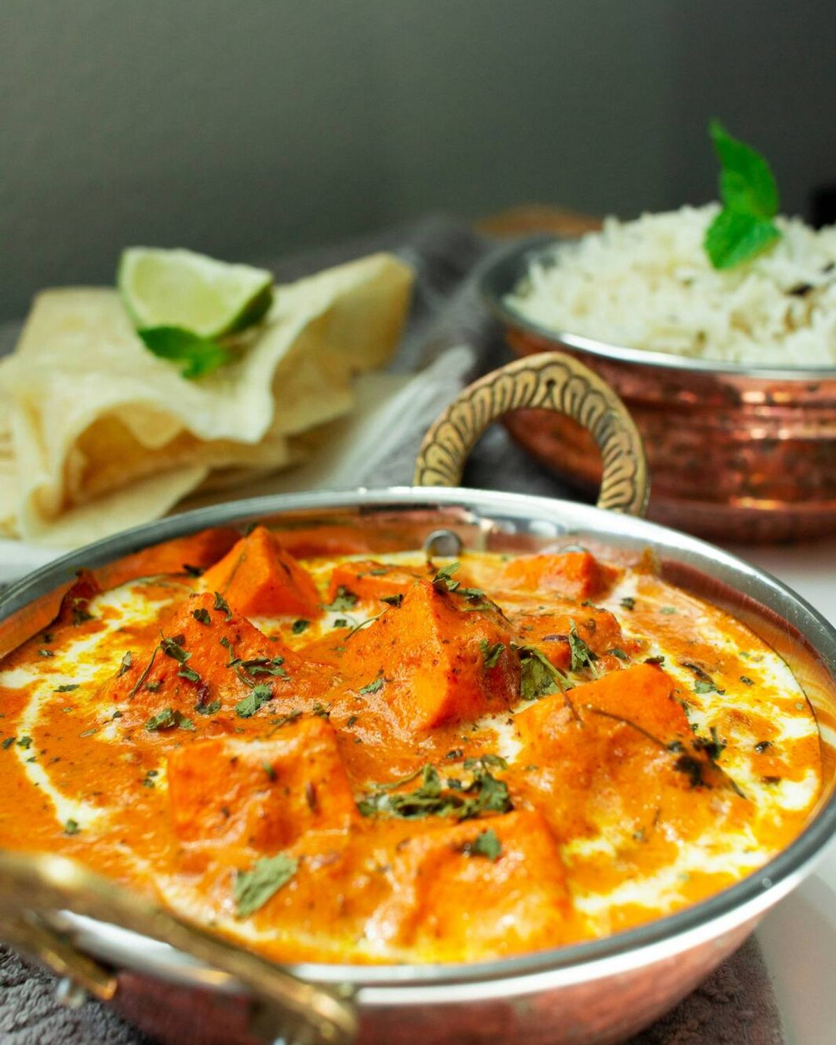 A karahi of slow-cooked meat and tomato, finished with green chili and coriander.